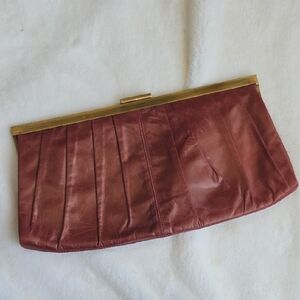 M. flynn 90s burgundy leather clutch with brass details
